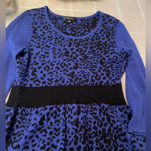 Spense Medium Midi Length knit Dress in a black and royal Blue print. - Picture 6 of 11